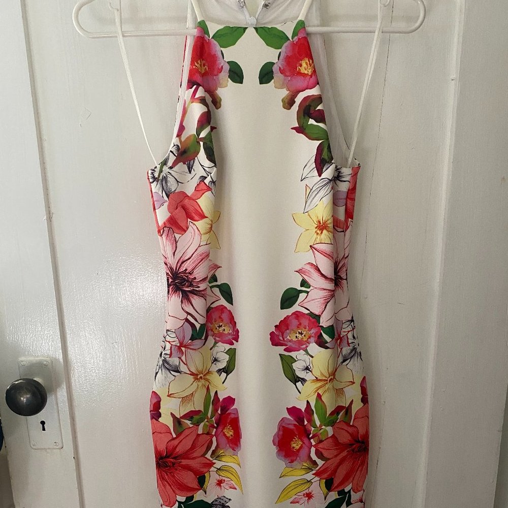 Guess dress in white with floral designs